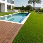 tahoe artificial grass in villa back garden next to pool and decking