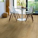dining space with quick step soft oak medium laminate flooring