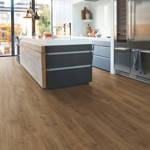 modern kitchen space with quick step new castle oak brown laminate floor
