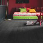 burned wooden plank laminate flooring in bedroom