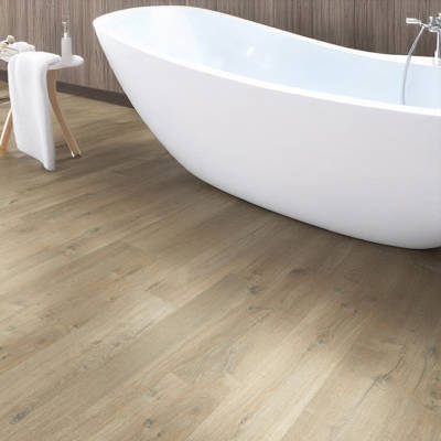quick step soft light brown oak laminate flooring in bathroom