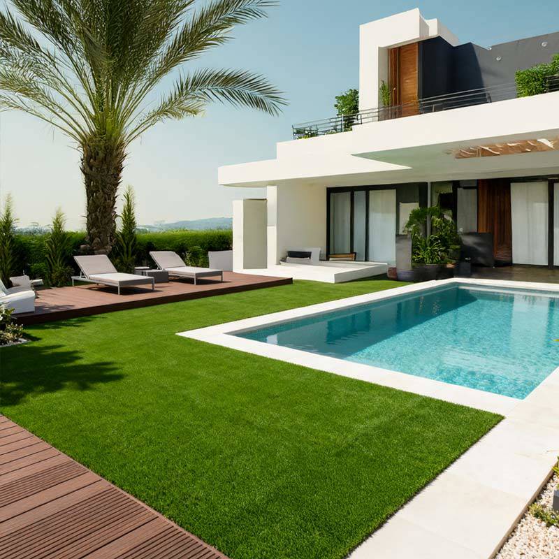 tahoe artificial grass in villa back garden next to pool