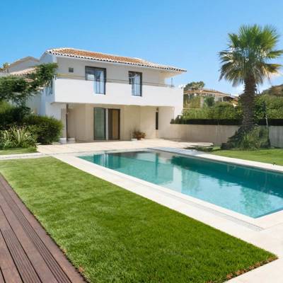 redwood 45 artificial grass turf in villa back garden with pool