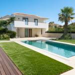 redwood 45 artificial grass turf in villa back garden with pool