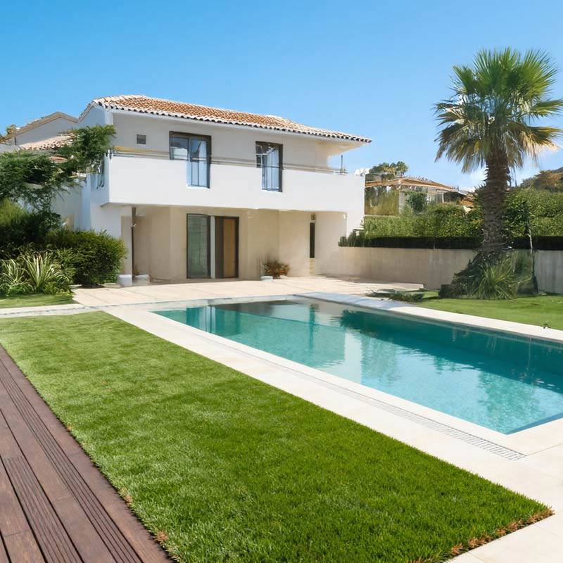 redwood 45 artificial grass turf in villa back garden with pool
