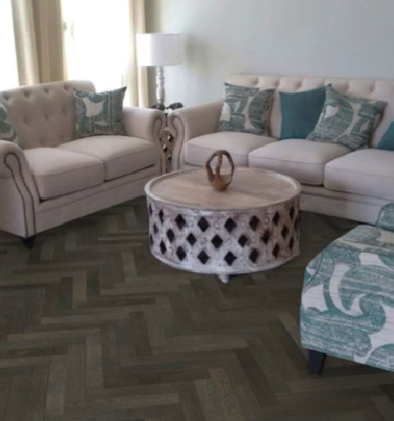 a living space with a parquet floor