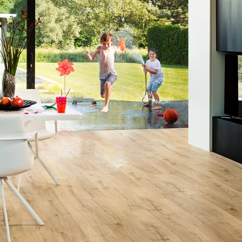 children playing on classic laminate oak beige flooring