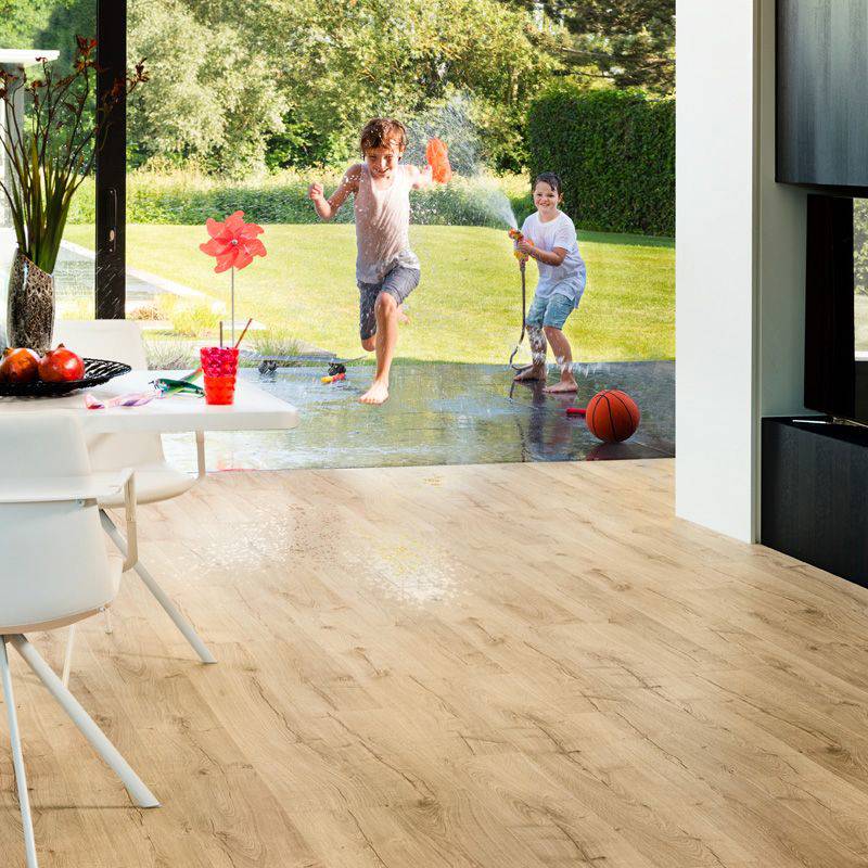 children playing on classic laminate oak beige flooring