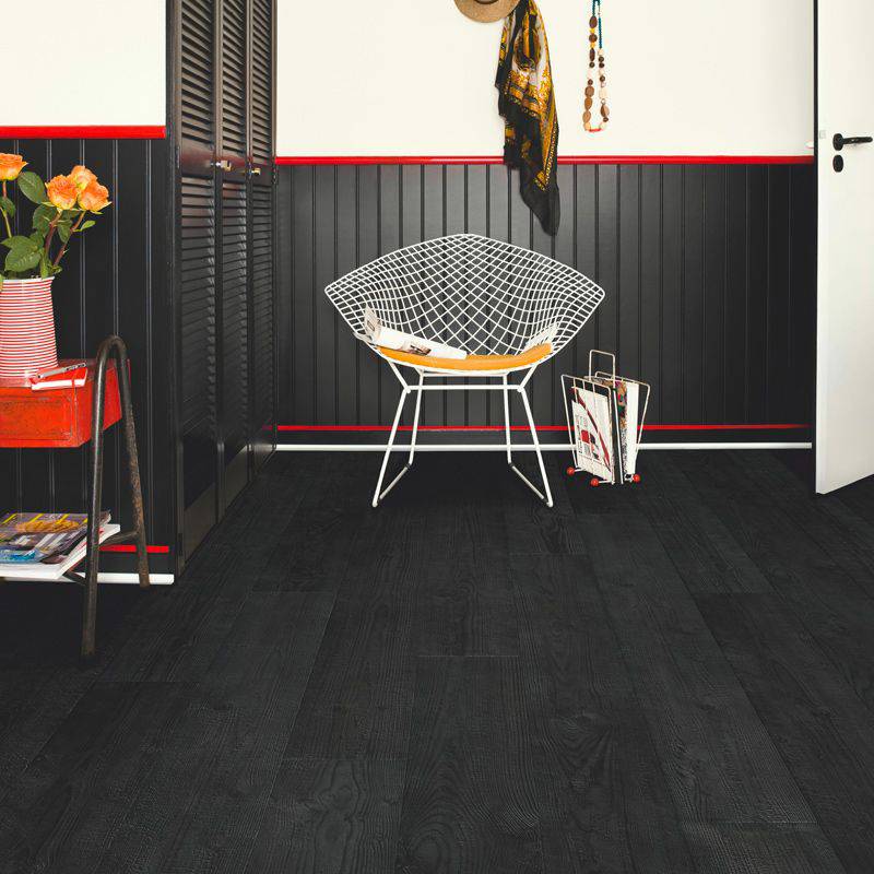 burned wooden plank laminate flooring in sitting space