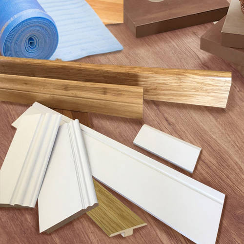 trims, skirtings, and other flooring accessories in a neat pile