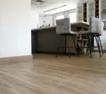 a living space with a wood laminate floor