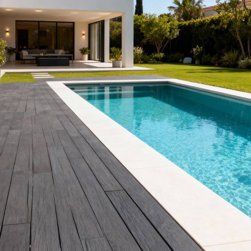 slate grey smart decking in garden with pool