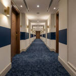 british carpet mills sky gardens 558 carpet tiles in hotel hallway