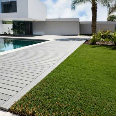 barun artificial grass in villa back garden next to pool and decking