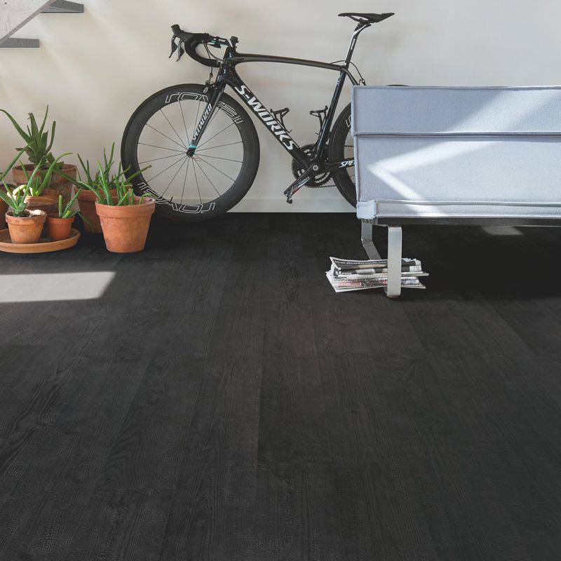 burned wooden plank laminate flooring in living space