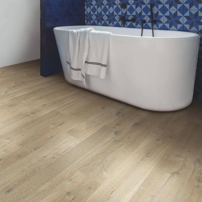 quick step soft light brown oak laminate floor in bathroom