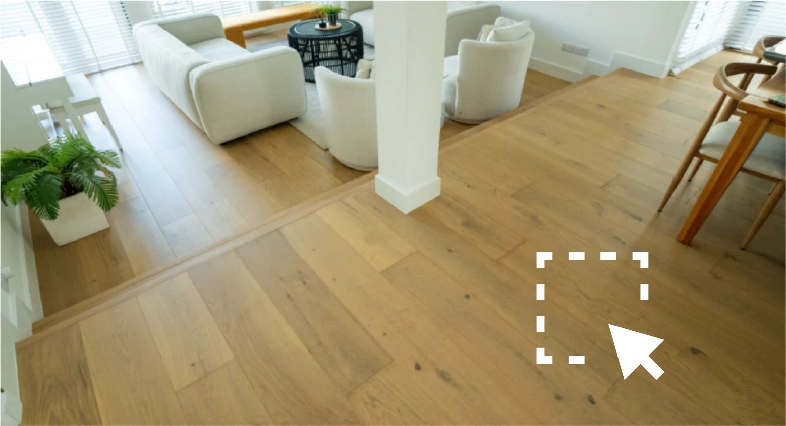 a living space with a wooden floor and measurement graphical overlay