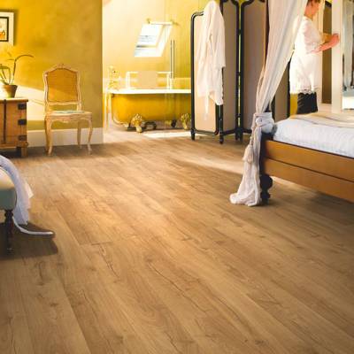 classic oak natural wooden laminate flooring in bedroom