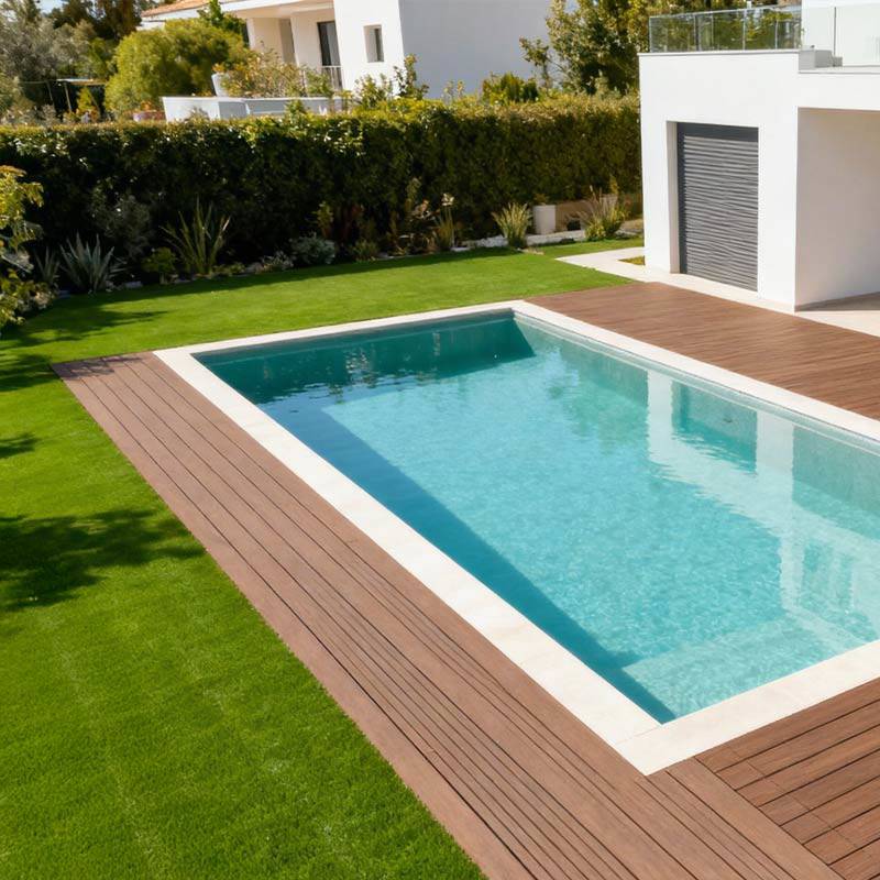 redwood 30 artificial grass in villa back garden next to pool and decking