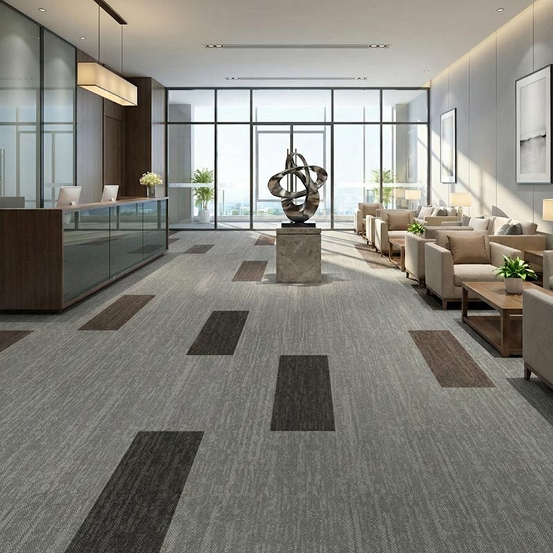 british carpet mill dark grey autumn patterned carpet tiles in high rise reception