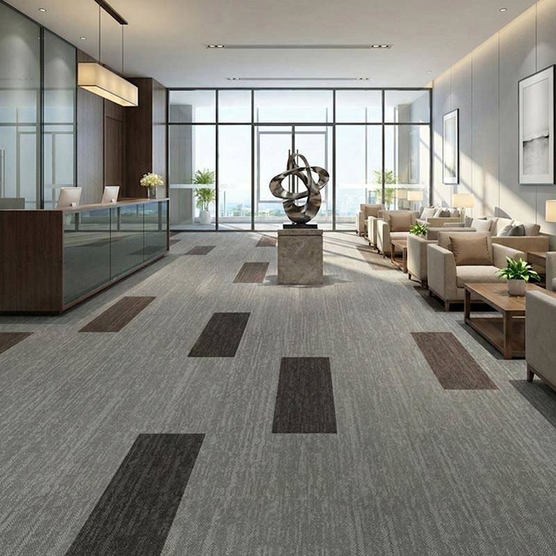 british carpet mill dark grey autumn patterned carpet tiles in high rise reception