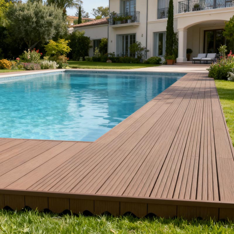 tobacco brown smart decking in villa back garden with pool