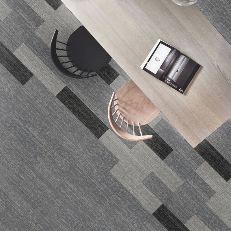 british carpet mills black and grey carpet tiles beneath desk