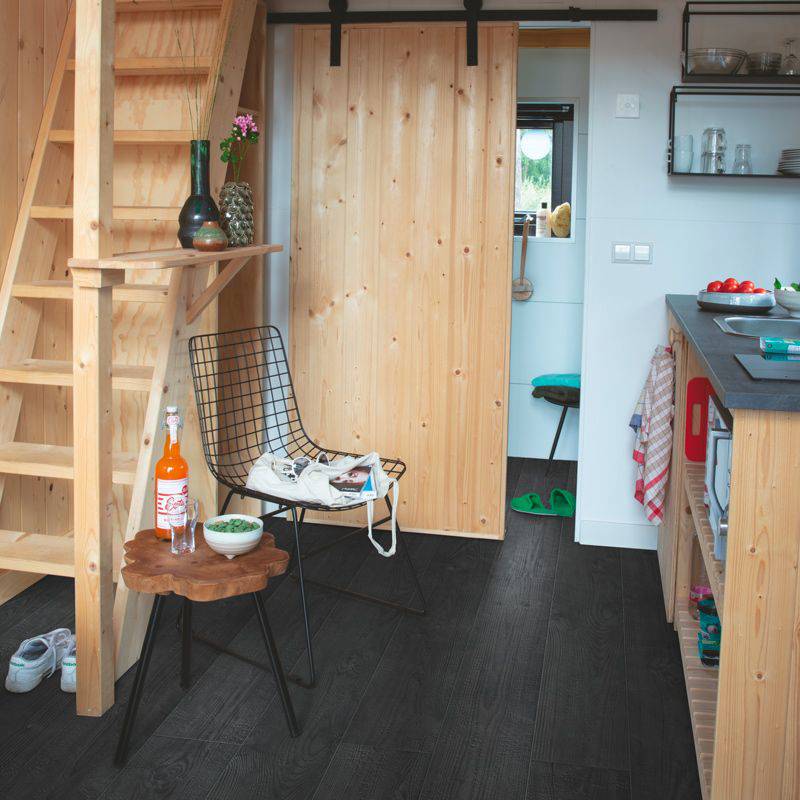 burned wooden plank laminate flooring in hallway
